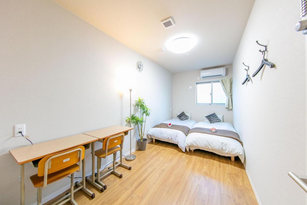 Guest House彩 Moriguchi Bagian luar foto